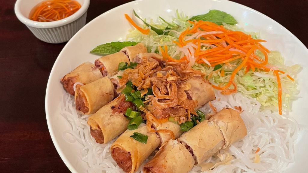 Bun Cha Gio · Spring roll Bun. Crispy spring rolls. Rice vermicelli noodles served w/ shredded lettuce, cucumber, pickled veggies, mint, & fish sauce.