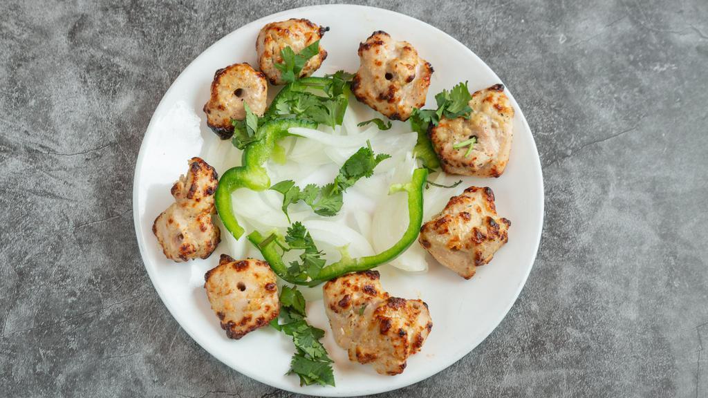 Chicken Malai Kabab · Tandoor oven grilled.