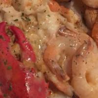 Lobster , Shrimp And Grits · Creamy Grits topped with Lobster and Shrimp in a Lobster Butter Sauce, Two Eggs
Please add e...