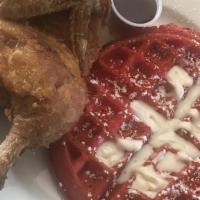 Red Velvet Waffle & Chicken · Belgian waffle drizzled with cream cheese icing and deep fried half chicken.