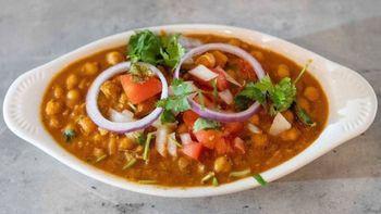 Channa Masala · Garbanzo beans cooked with a blend of spices and fresh tomatoes, onions and herbs