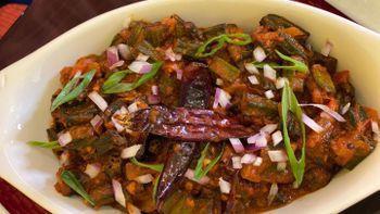 Bhindi Masala · Diced okra cooked with a combination of onion & tomato sauce.