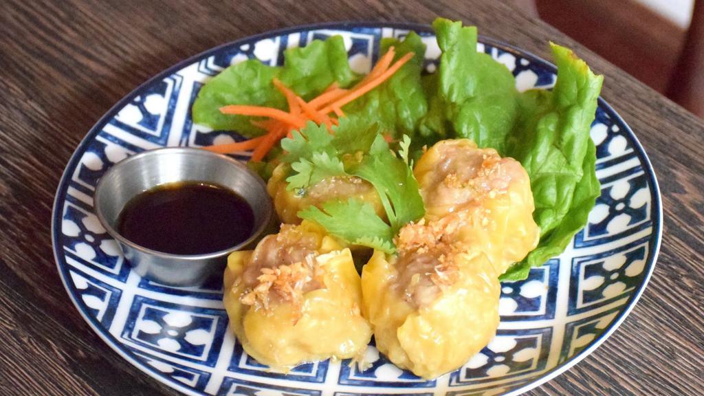 Steamed Dumplings · steamed dumpling stuffed with chicken, sweet soy sauce