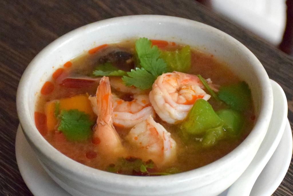 Tom Yum · Bell pepper and mushroom with spicy and sour soup. Hot and spicy.
