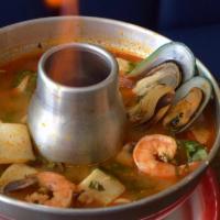 Seafood Tom Yum Soup · jumbo shrimp, calamari, New Zealand mussel, scallop, bell pepper, mushroom in spicy and sour...