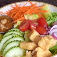 Green Salad · lettuce, cucumber, red onion, fried tofu, tomato, carrot, peanut dressing