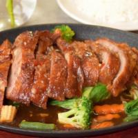 Crispy Three Flavors Duck · deep fried boneless half duck, three flavors sauce, steamed mixed vegetable served with jasm...