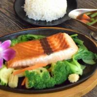 Spicy Basil Salmon · seared 8oz wild caught Norwegian salmon steak, steamed mixed vegetable, basil sauce served w...