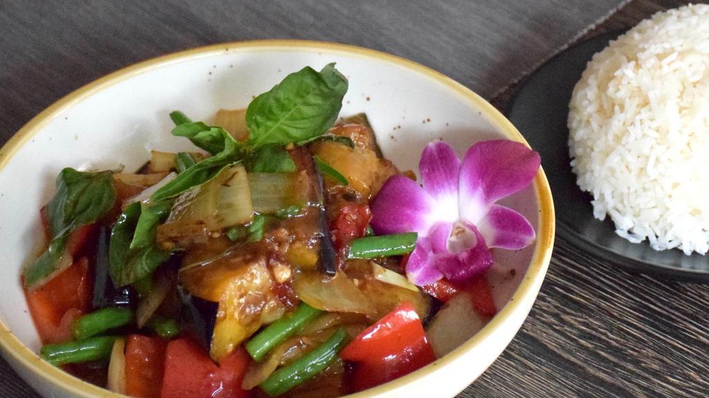 Spicy Basil Eggplant · spicy. eggplant, onion, bell pepper, string bean, basil, chili servedwith jasmine rice