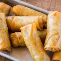 Spring Roll  上海卷 · With shredded carrot, mushroom and cabbage wrapped in a thin crispy wrap