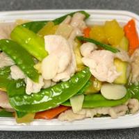 Pineapple Chicken 菠蘿鸡 · sliced white meat chicken, pineapple cubes, snow peas, and bamboo shoots in tasty white sauce.