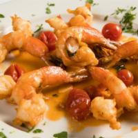 Shrimp Allo Scoglio · Shrimp in garlic, olive oil and grape tomato sauce, over spinach.