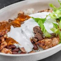 High Protein Bowl · White Lime Rice, Black Beans, Grilled Chicken, Steak, Spicy Salsa, Sour Cream, Romaine Lettu...