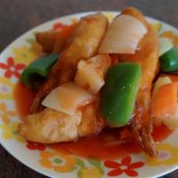 Sweet & Sour Shrimp · Lightly battered jumbo shrimp, green peppers, carrots and pineapple served with sweet and so...