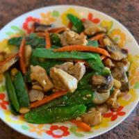 Chicken With Snow Peas · With white rice.