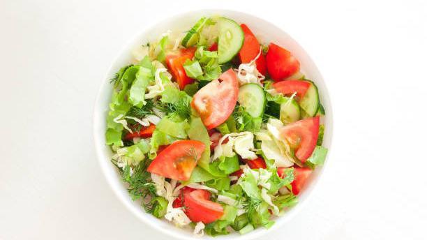 Garden Salad · With ginger dressing.