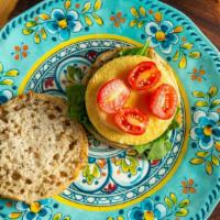 No Egg'N'Around - Vegan, Gf · Vegan, Gluten-Free Sandwich with 'JUST' egg substitution, spinach, and tomato, on a Gluten-F...