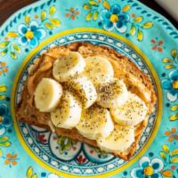 Toast #1 · Whole Grain Toast, topped with Peanut Butter, Banana slices, and a sprinkle of Chia Seeds