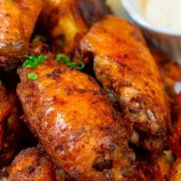 Cajun Wings · Wings tossed with Cajun served with your choice of blue cheese or ranch.