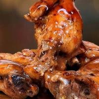 Mango Habanero Wings  · Wings tossed with mango habanero wings sauce served with your choice of blue cheese or ranch.