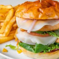 Classic Chicken Sandwich · Chicken breast with cheese, lettuce, tomato, red onions, and pickles.