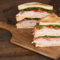 Chicken Club Panini · Hot sandwich with grilled chicken, crispy smoked bacon, brie cheese, plum tomatoes and house...