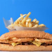 Crispy Onion Cheesesteak Combo · 8” Philly cheesesteak loaded with grilled steak, melted cheese and crispy onion rings on a t...