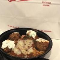 Spaghetti & Meatballs · Four Sicilian meatballs, fresh ricotta, and parmesan cheese served with garlic bread.