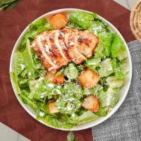 Chick On The Grill Salad · Romaine lettuce, grilled chicken, house croutons, and parmesan cheese tossed with caesar dre...