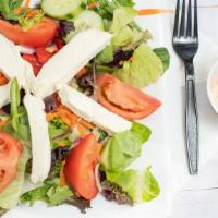 House Salad · Romaine lettuce, baby greens, black olives, red onions, ripe tomatoes, cucumbers, roasted pe...