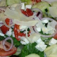 Mediterranean Salad · Iceberg and romaine lettuce, black olives, cucumbers, onions, peppers, and feta cheese.