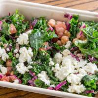 Large Kale Salad Meal · Kale, garbanzos, feta cheese, tomatoes, red cabbage,  chickpeas and lemon-dill dressing.