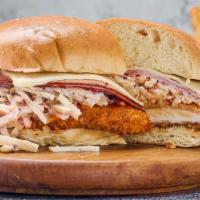 Buffalo Chicken Sandwich · Buffalo chicken, with ham and cheese , coleslaw, pickles; Brioche bun