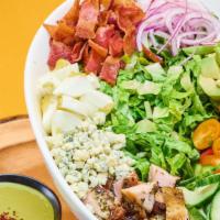 Cobb Salad · Romaine lettuce, chicken, tomato, avocado, bleu cheese, bacon, onion, cucumber .
blue cheese...
