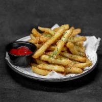 Truffle Fries · Crispy hand-cut fries with sea salt and white truffle essence.