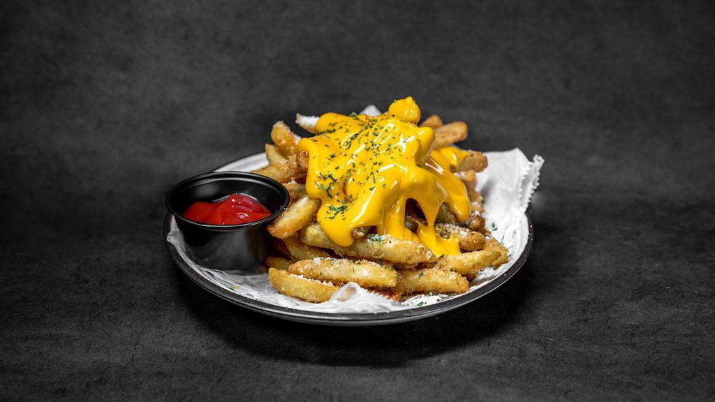 Cheese Fries · Crispy hand-cut fries with our homemade cheese sauce.