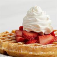 Strawberry Waffle · A golden waffle, topped with fresh strawberries, dusted with powdered sugar, and crowned wit...
