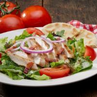 Chicken Blt Salad · A grilled and sliced chicken breast placed on a salad of crisp garden greens, chopped applew...