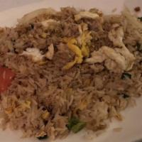 Dinner Crab Fried Rice · Crab with tomatoes, onions, scallions and egg.