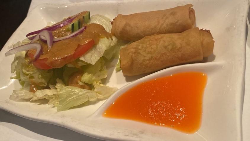 Original Spring Rolls · Vegetable spring rolls served with a carrot sauce.