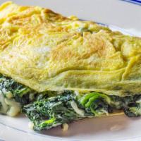Greek Spinach Omelette · Sautéed spinach, fresh garlic, onions, scallions, dill in extra virgin olive oil, chopped to...