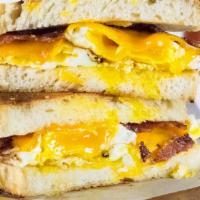 Breakfast Double Fried Egg Sandwich · Breakfast Double Fried Egg Sandwich. Served On White Toast. With Your Choice Of Breakfast Me...