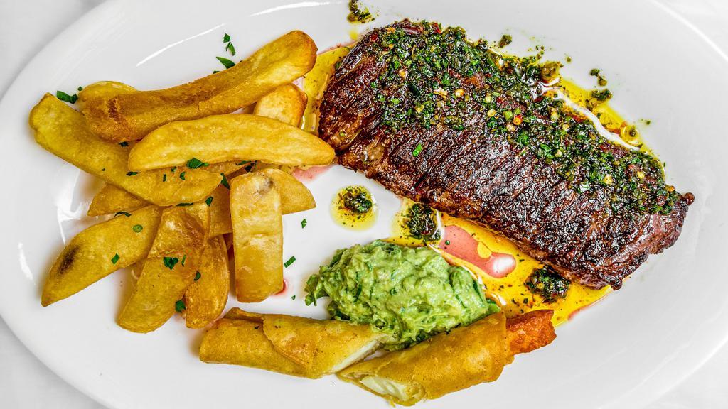 Chili-Chimichurri-Skirt Steak · Skirt-steak with chimichurri sauce and served with a side of French fries and side of pico de gallo.( please specify the cooking temperature( rare )( medium rare) ( medium )( medium well) ( well done ).