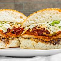 Cemita Torta · Sesame-seed bread, with refried beans, quesillo, avocado, tomatoes, papalo, chipotle sauce, ...