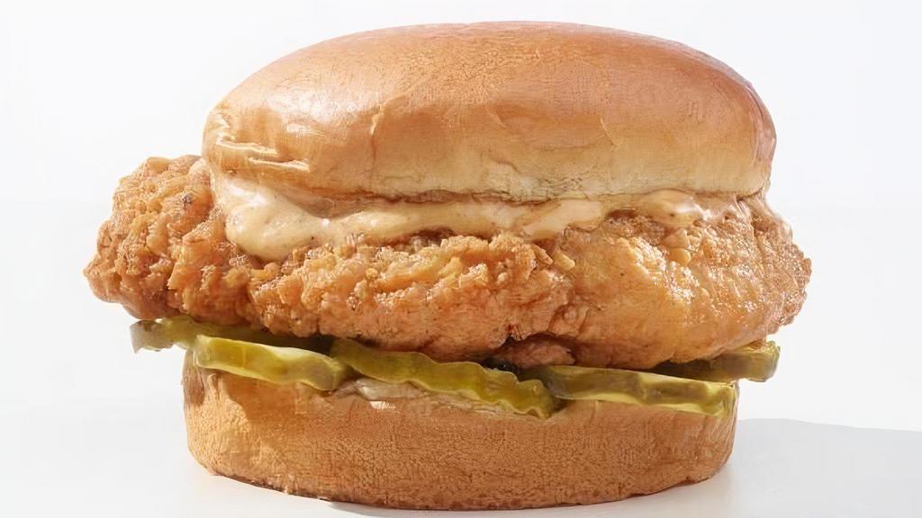 Crispy Chicken Sandwich · Golden fried chicken breast with mayo and pickles. Your choice of traditional or spicy.