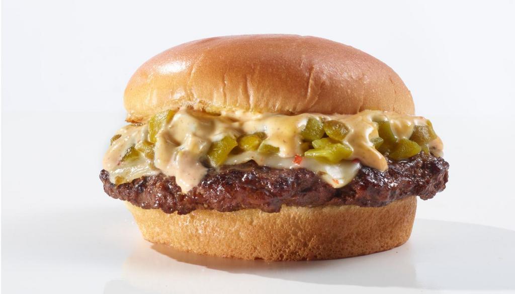 Green Chile · Classic burger seasoned with our signature searing spice with pepper jack cheese and fire roasted green chilies on a toasted brioche bun topped with a chipotle mayo.