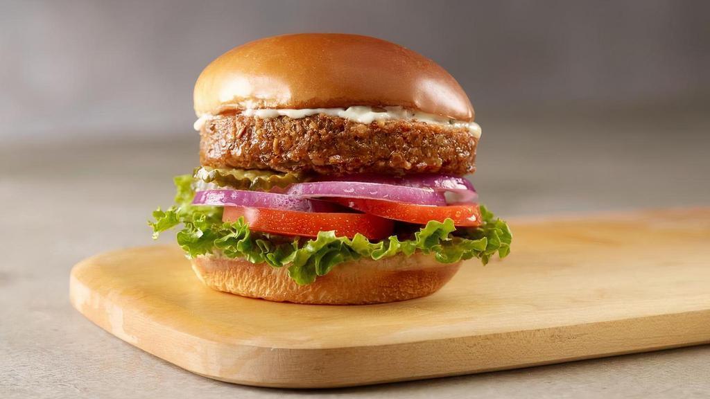 Good Seed Veggie Burger · Our veggie patty is packed with super foods like chia and hemp seeds, sprouted grains, and spices. Served Falafel style with lettuce, tomato, red onion, pickles and topped with a garlic mayo and touch of sriracha.