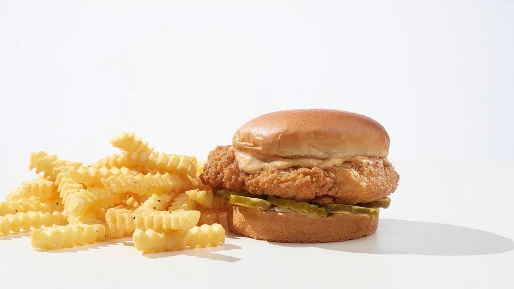 Crispy Chicken Combo · Golden fried Chicken breast with mayo and pickles. Your choice of traditional or spicy with crinkle fries and your choice of drink.
