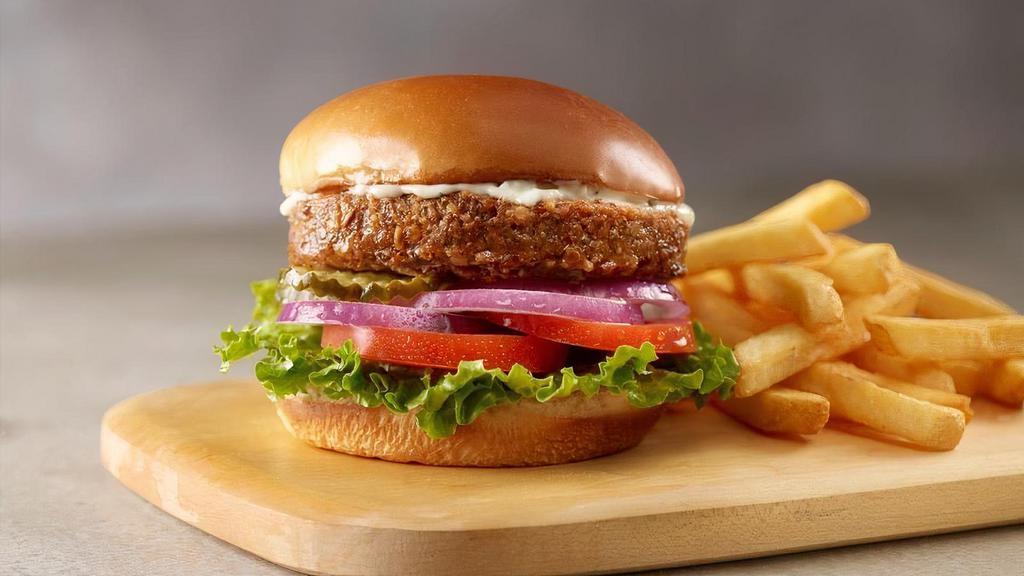 Good Seed Veggie Burger Combo · Our veggie patty is packed with super foods like chia and hemp seeds, sprouted grains, and spices. Served Falafel style with lettuce, tomato, red onion, pickles and topped with a garlic mayo and touch of sriracha.with Crinkle Fries and your choice of drink.