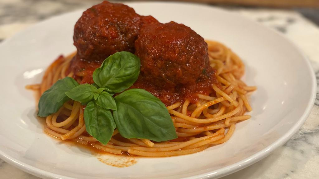 Spaghetti & Meatballs · Spaghetti with tomato & basil sauce served with two all beef house made meatballs